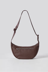 the vegan leather sling bag