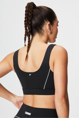 medium impact piped sports bra