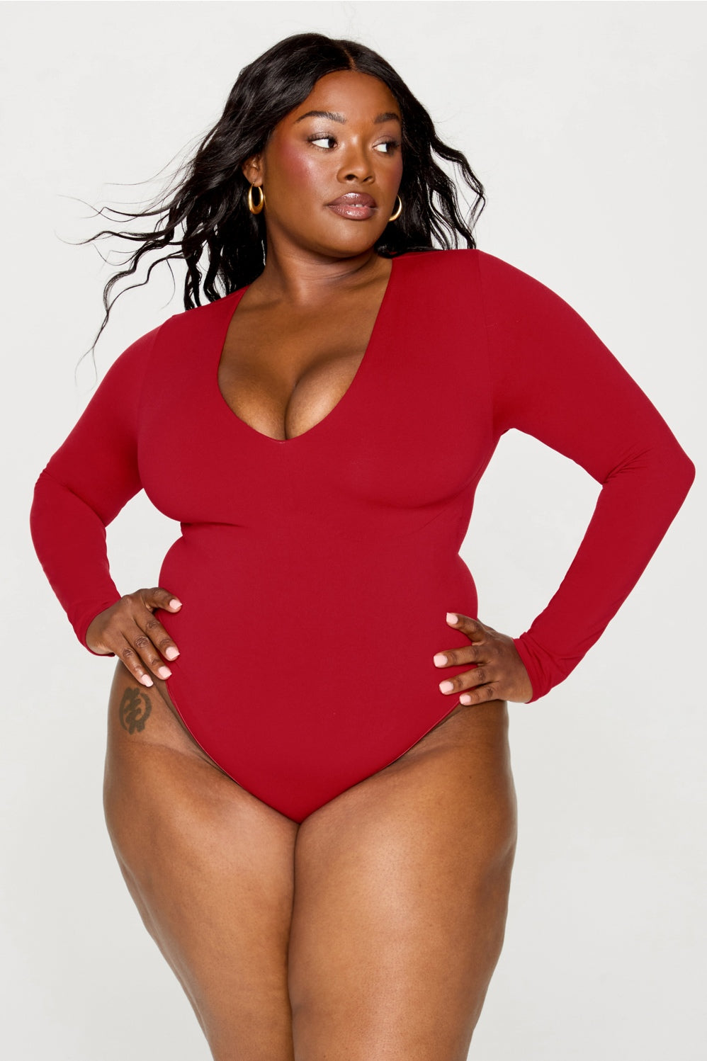 nearly naked shapewear plunge long sleeve bodysuit
